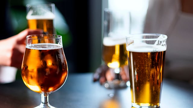 Beer glasses on dark table-smaller