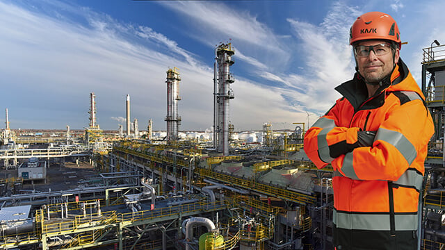 proud-engineer-in-front-of-oil-refinery-right